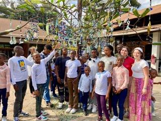 Volunteers playing games with children