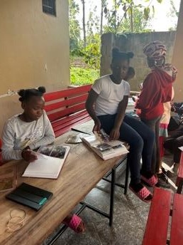 Children receiving new clothes and shoes