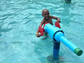Children on trampolines and playground